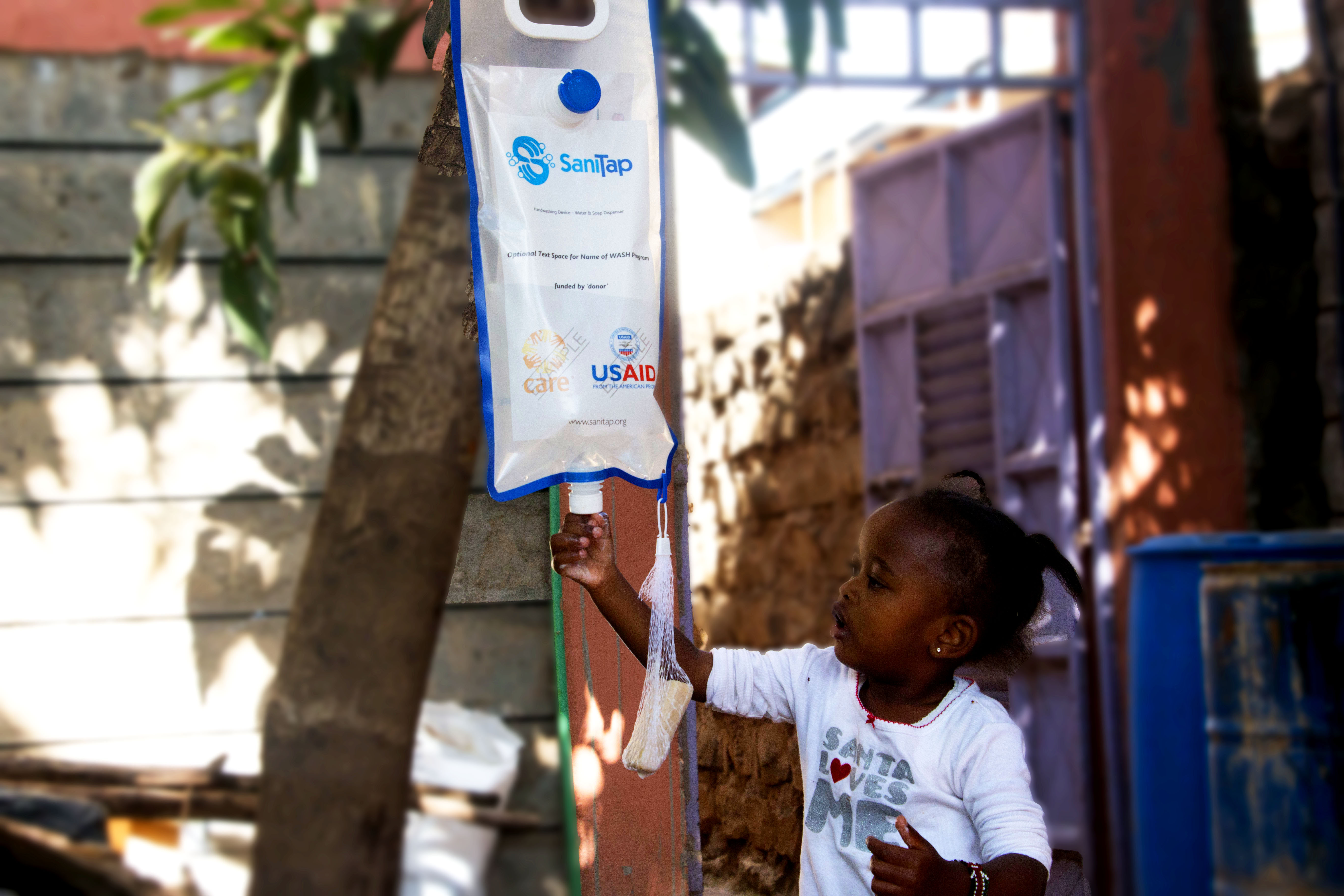 SaniTap - a handwashing device that helps reduce the spread of COVID-19 in developing countries / refugee and IDP camps