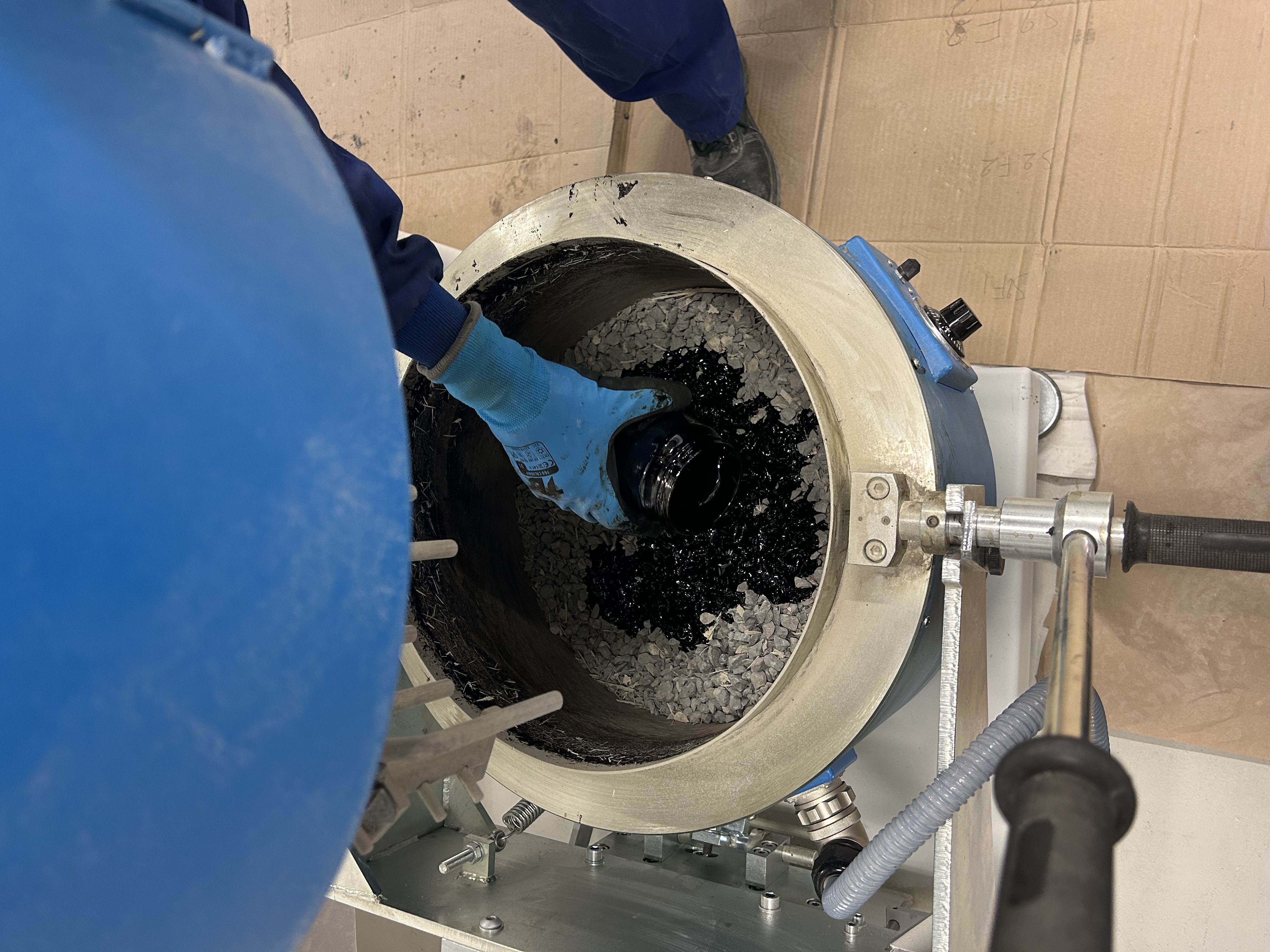 Durable porous asphalt mixture using recycled wind turbine blade materials